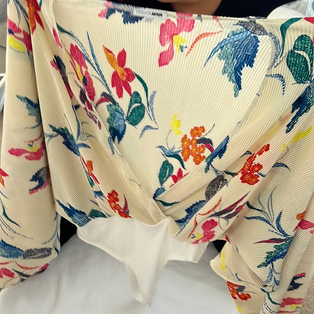 It’s a one piece blouse with a very low cut front!